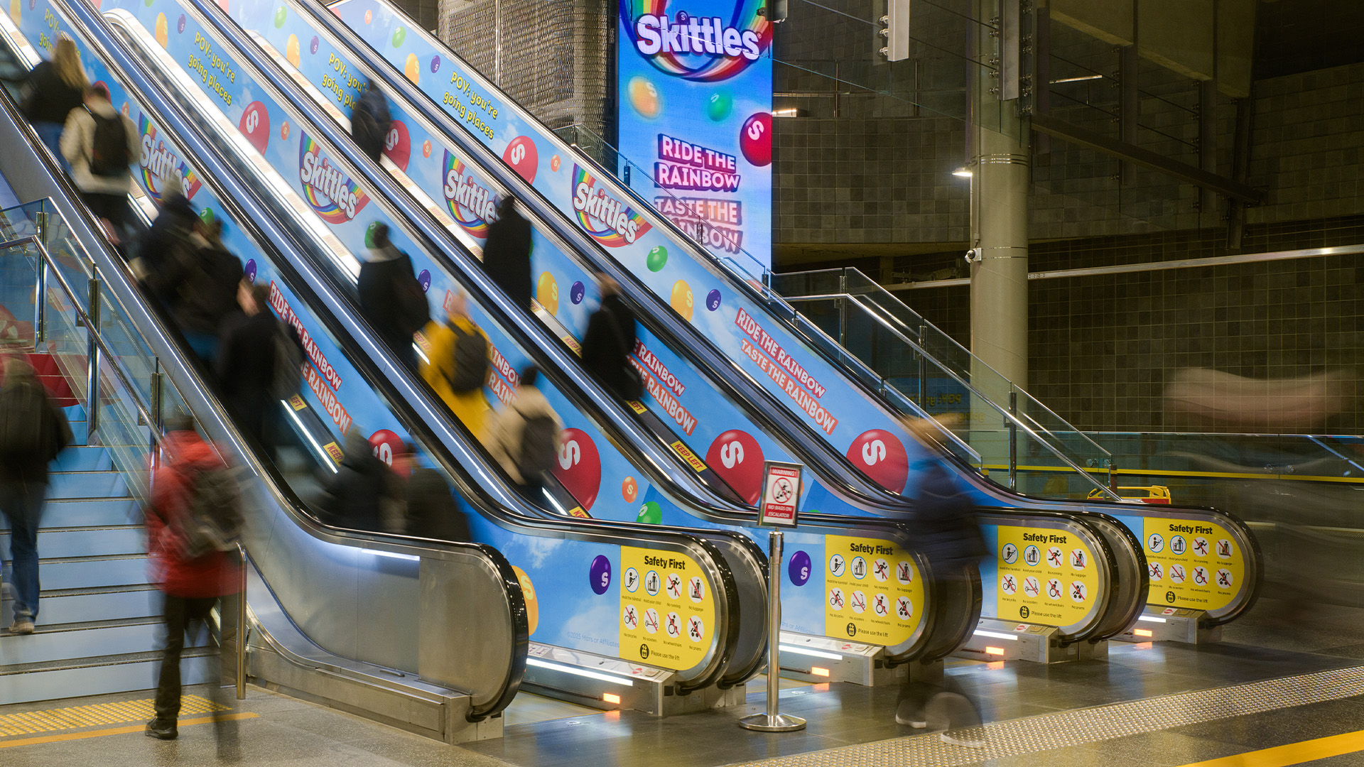 NZ_Transit-Hubs__0009_Skittles Britomart Takeover - Escalator 2